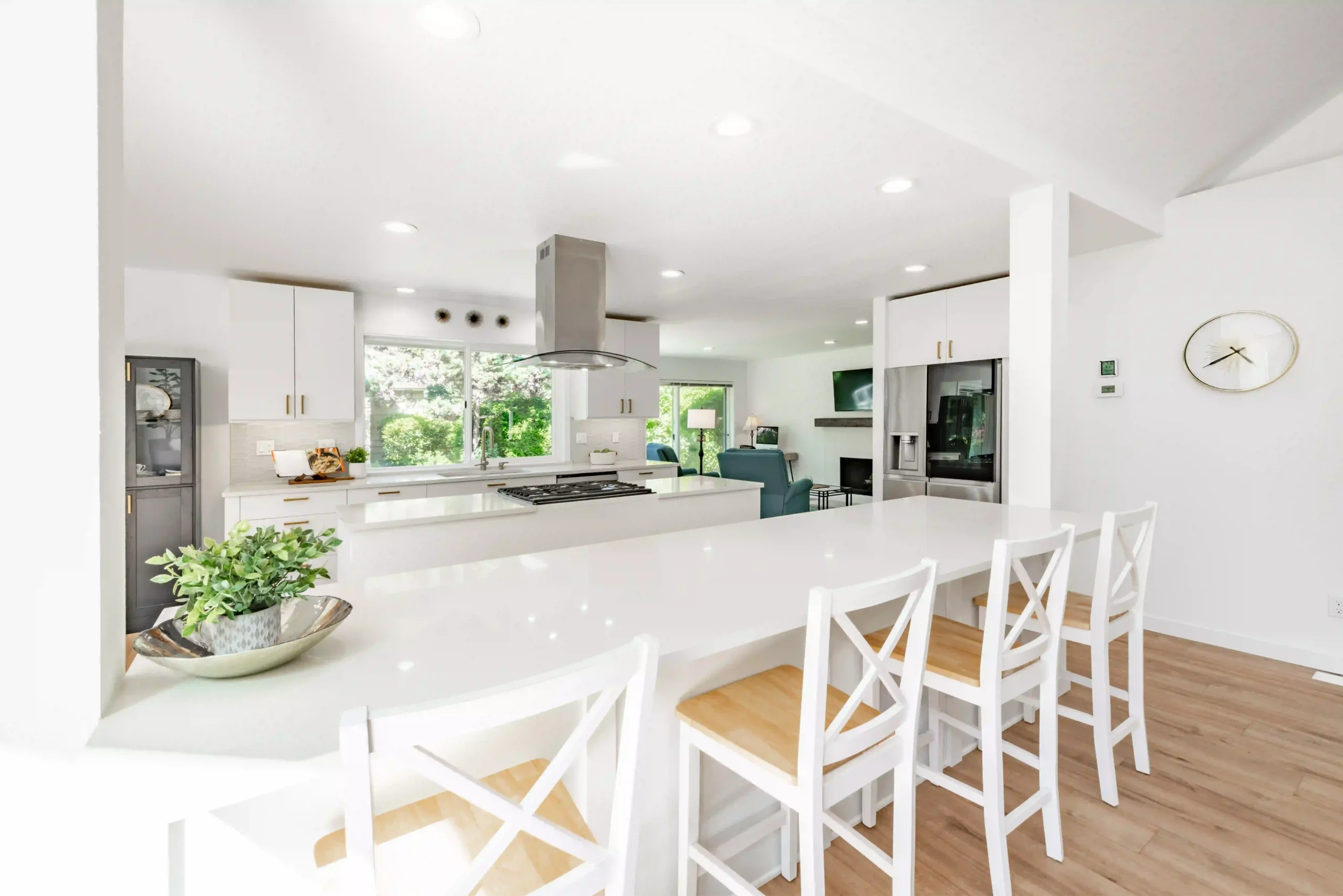 Painter using roller to coat ceiling with fresh paint in Bulleen home