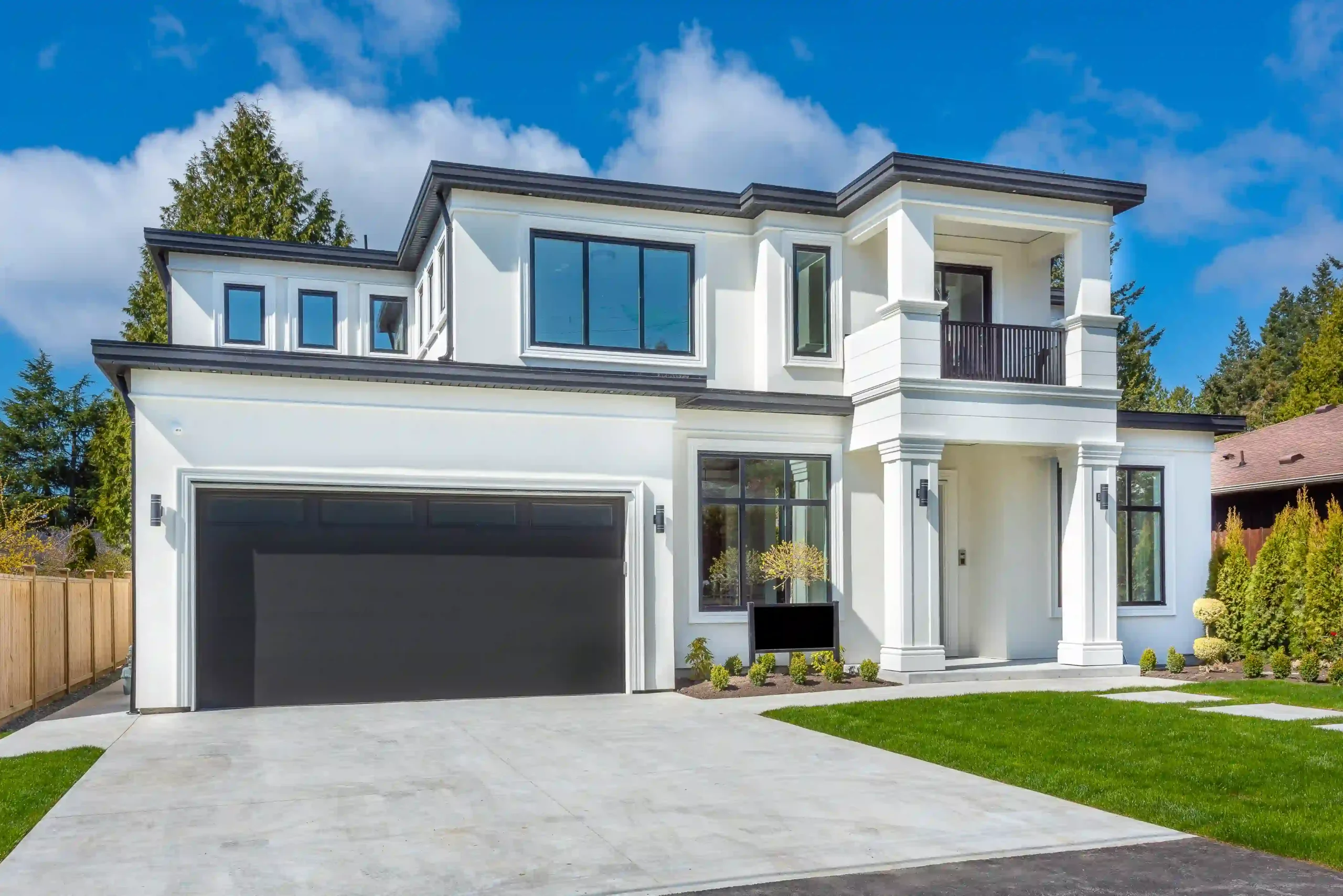 Modern luxury home exterior painted by GoBrush Painting in Melbourne – High-contrast white walls with black trim